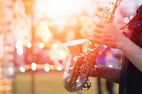 Man playing a saxophone at the Lowcountry Jazz Festival