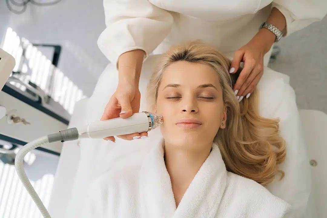 Best Nonsurgical Summer Facial Refresh Happy patient Getting Laser Skincare Treatment